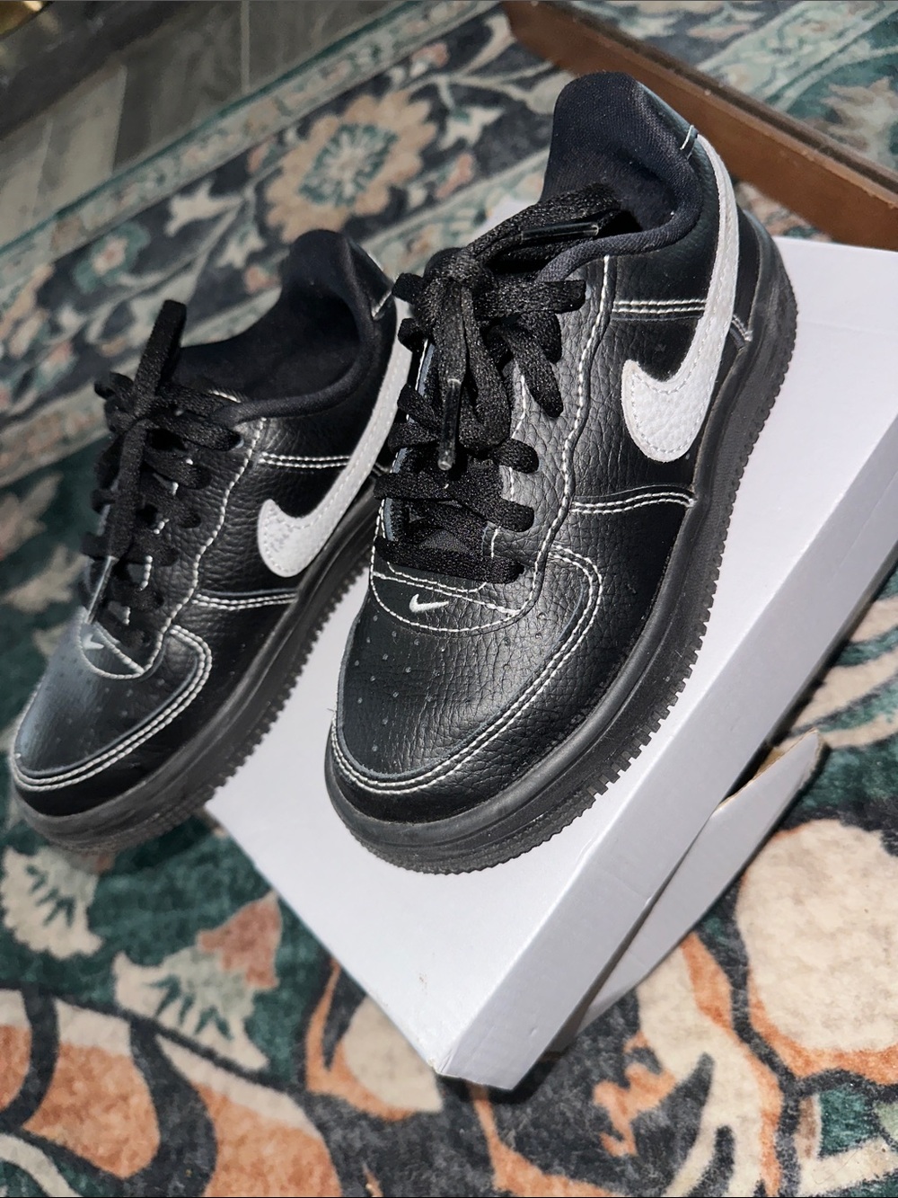Nike Kids Black Sneakers with White Swoosh